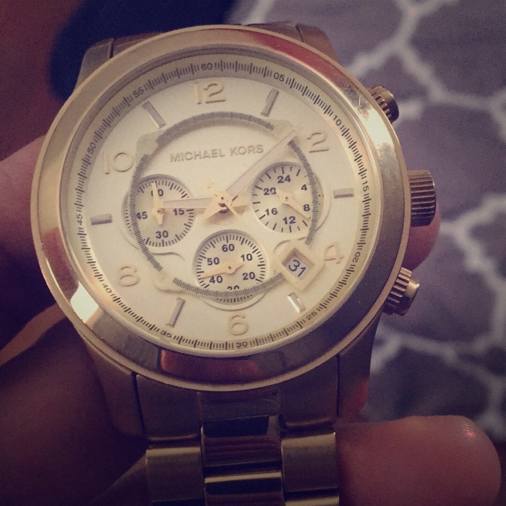 Oversized unisex Michael Kors gold watch